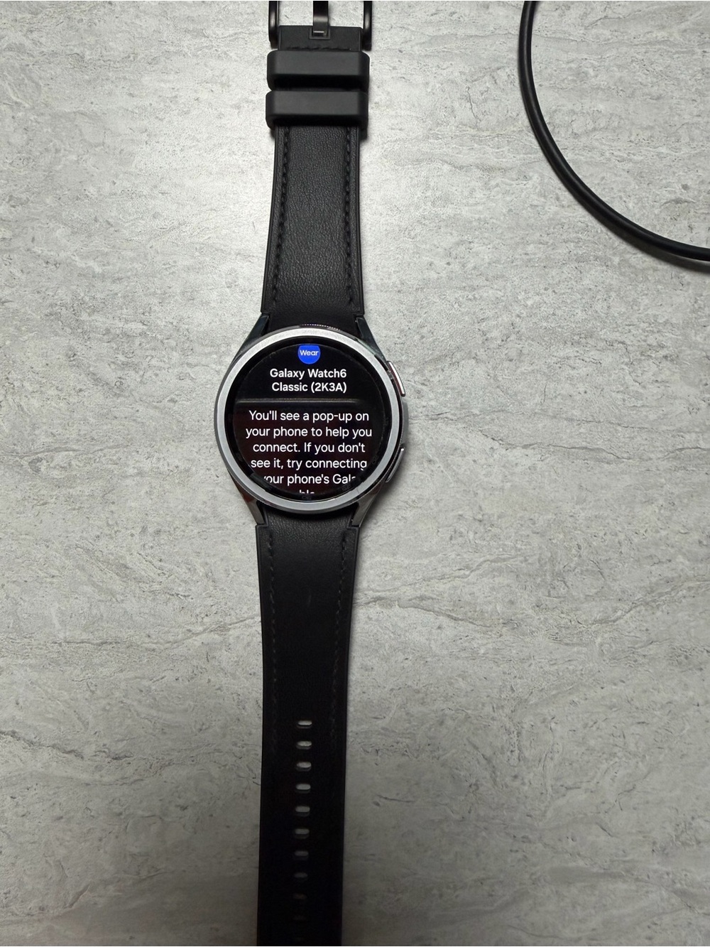 Samsung Smartwatch with Silver Case and Black Strap